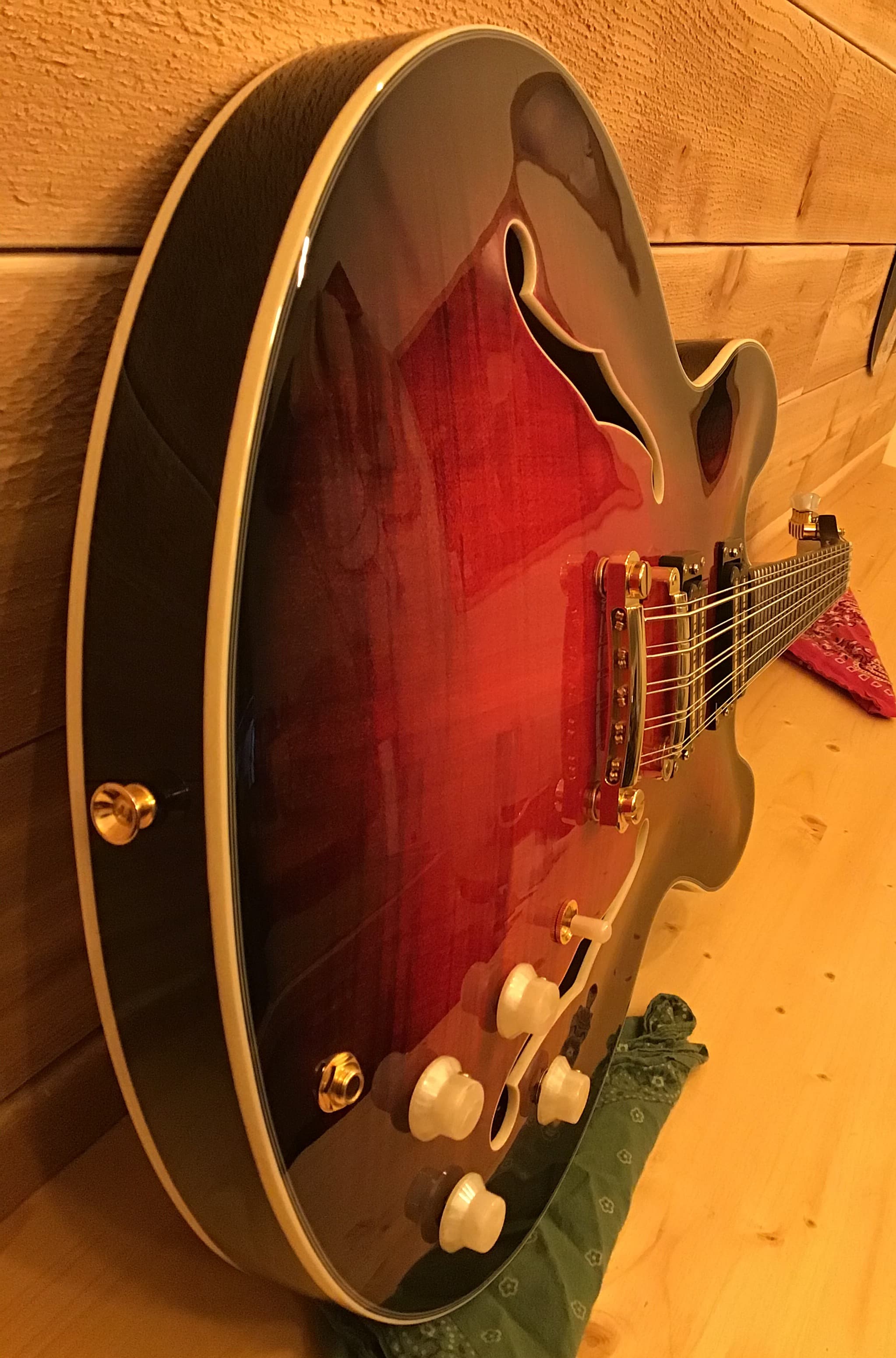 A finished semi-hollow body guitar, built by Mountain Ash Guitar
